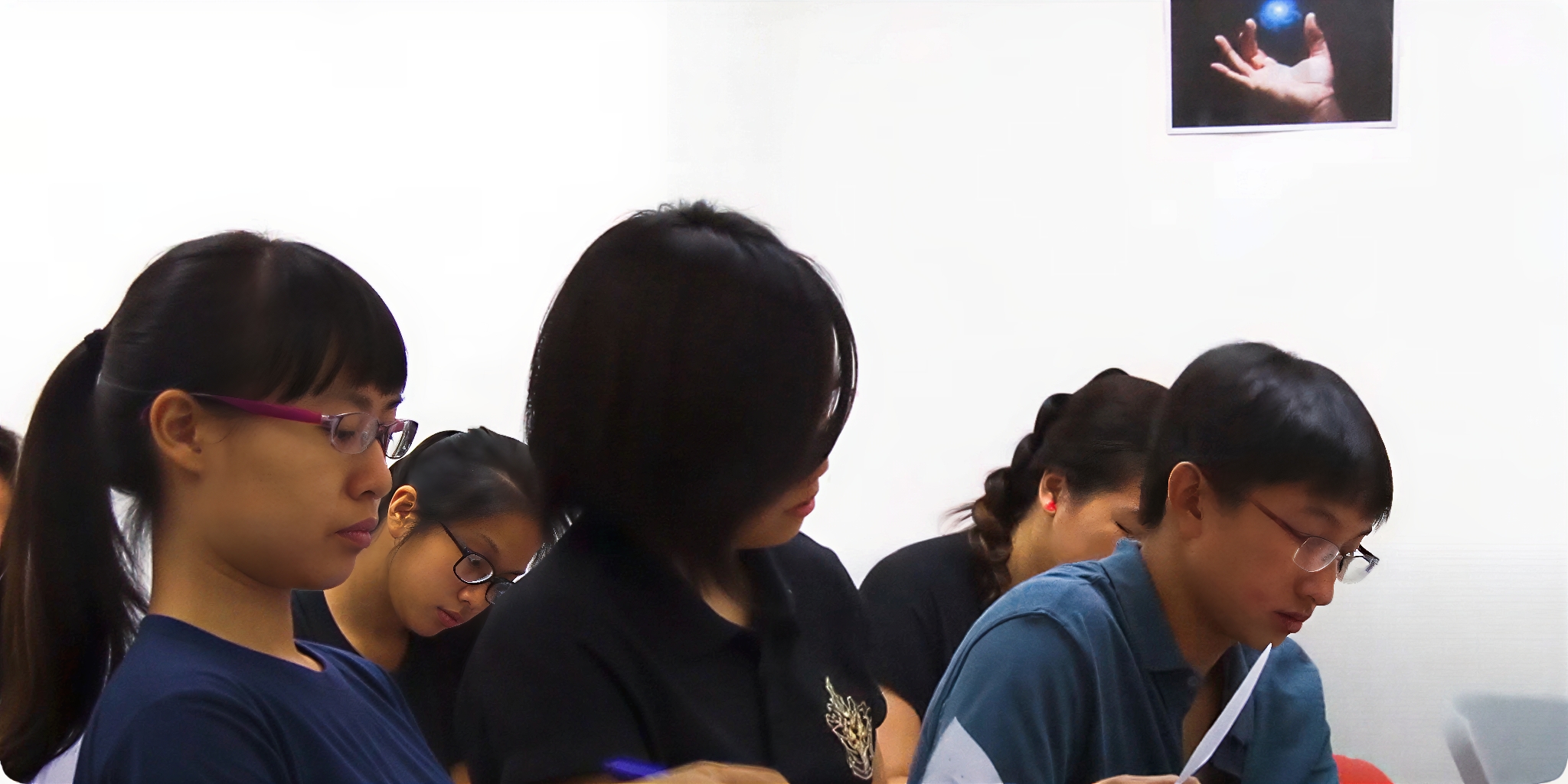 Students learning concepts of JC Economics
