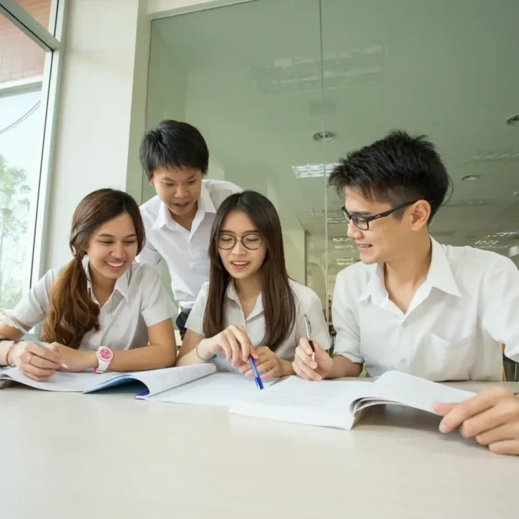 students at a jc economics tuition centre reviewing the material students at a jc economics tuition centre reviewing the material